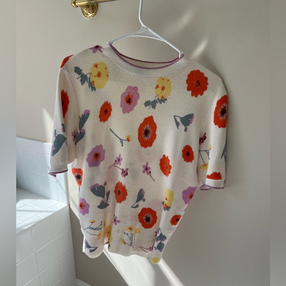 White shirt with red, purple, and yellow flowers size MP in women’s